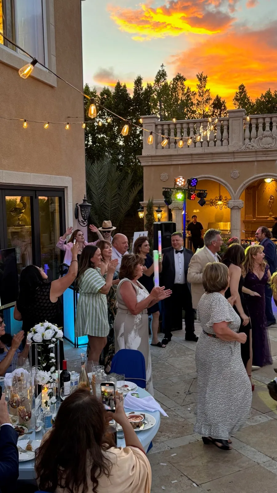 Guests celebrating at sunset at a Poway estate wedding reception