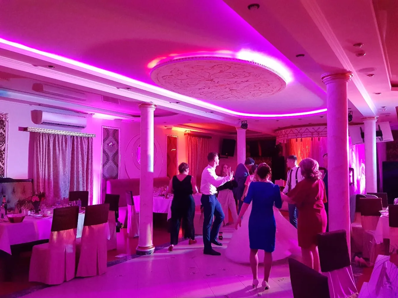 Guests dancing on the wedding dance floor at a San Diego reception